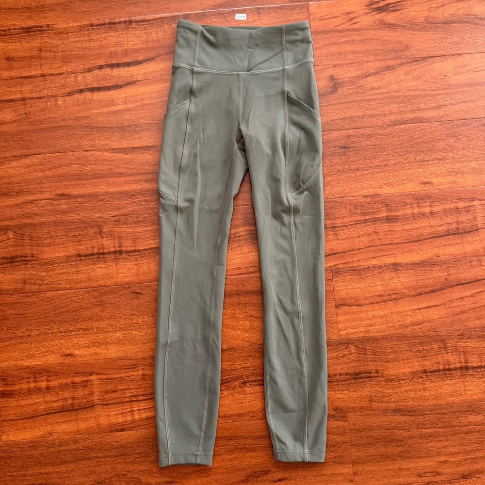 Lululemon Wunder Train High-Rise Tight Pockets 25" Size 0 Willow Green